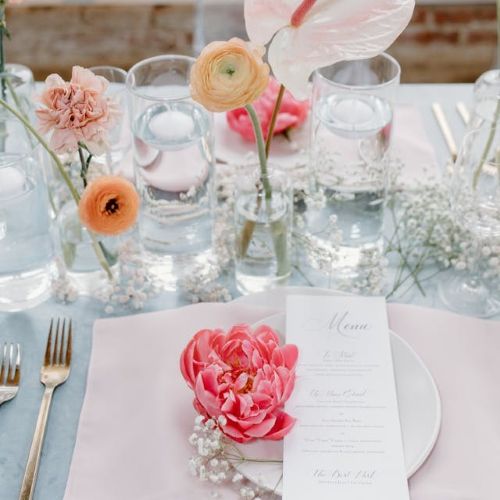 Pink peony and ranunculus floral table setting — shop garden party dresses and outfits at Color Game Fort Worth