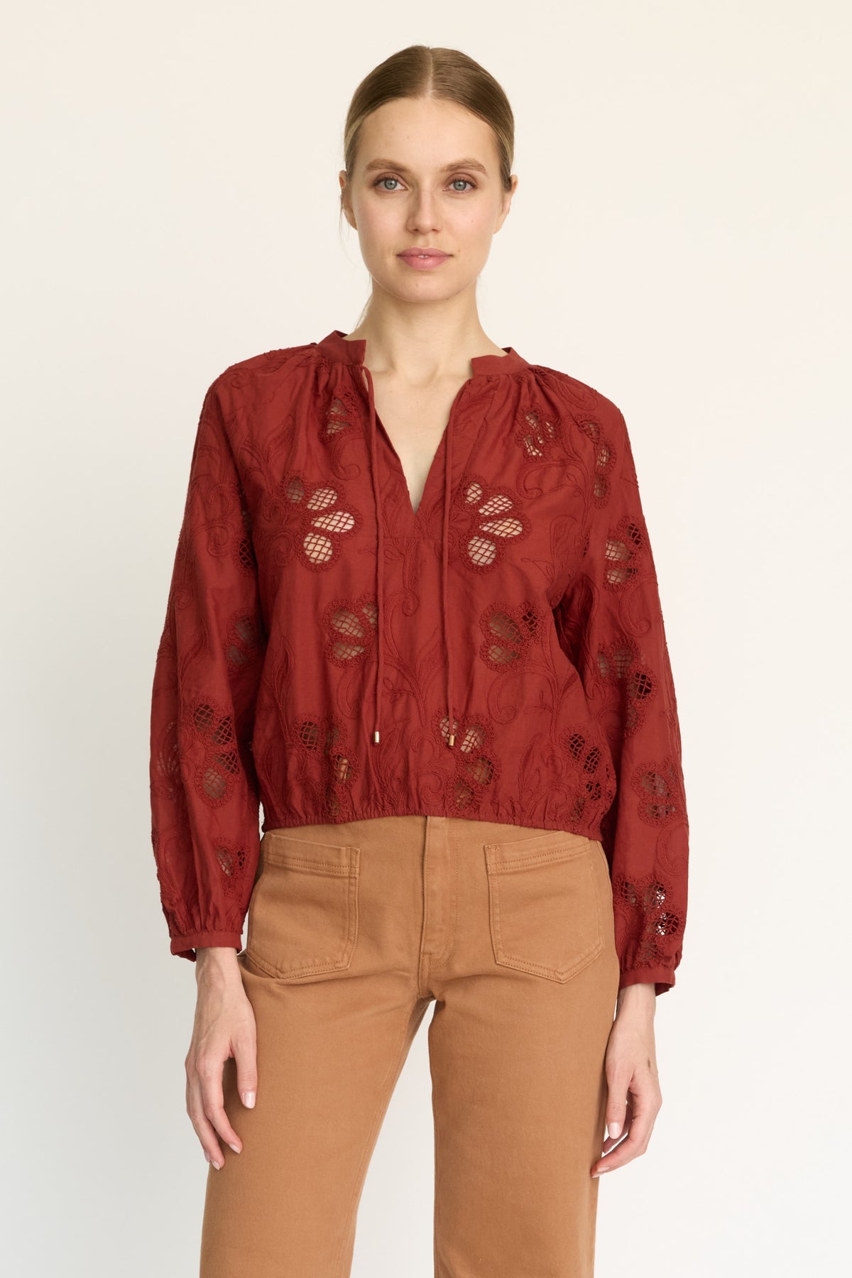 Model wearing the Dolly fired brick lace top by Caballero Collection