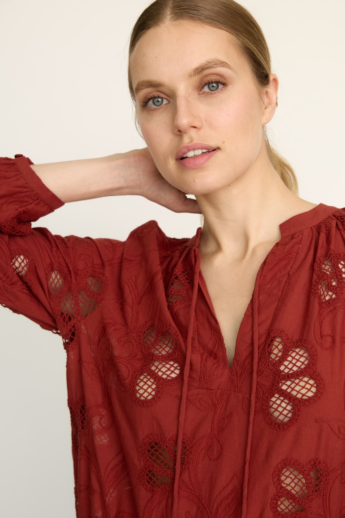 Dolly fired brick lace top styled with shorts