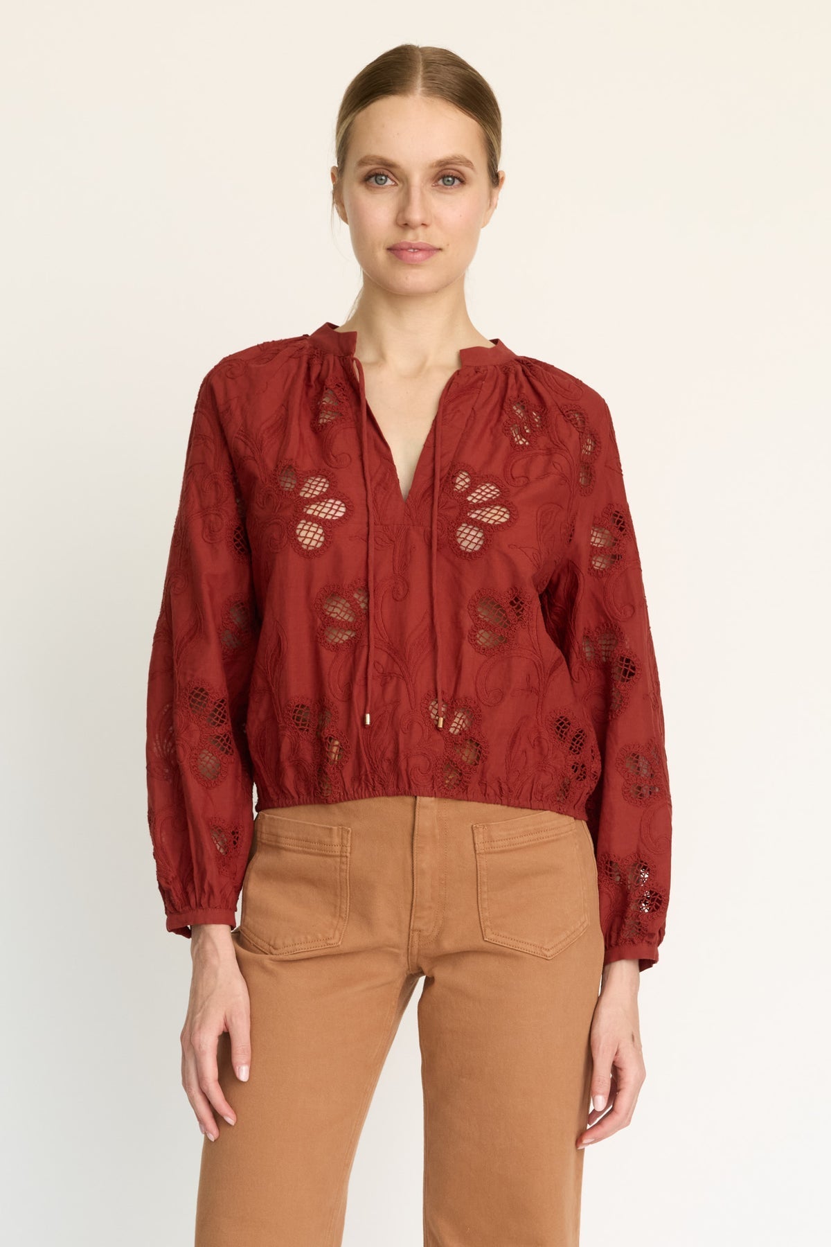 Model wearing the Dolly fired brick lace top by Caballero Collection