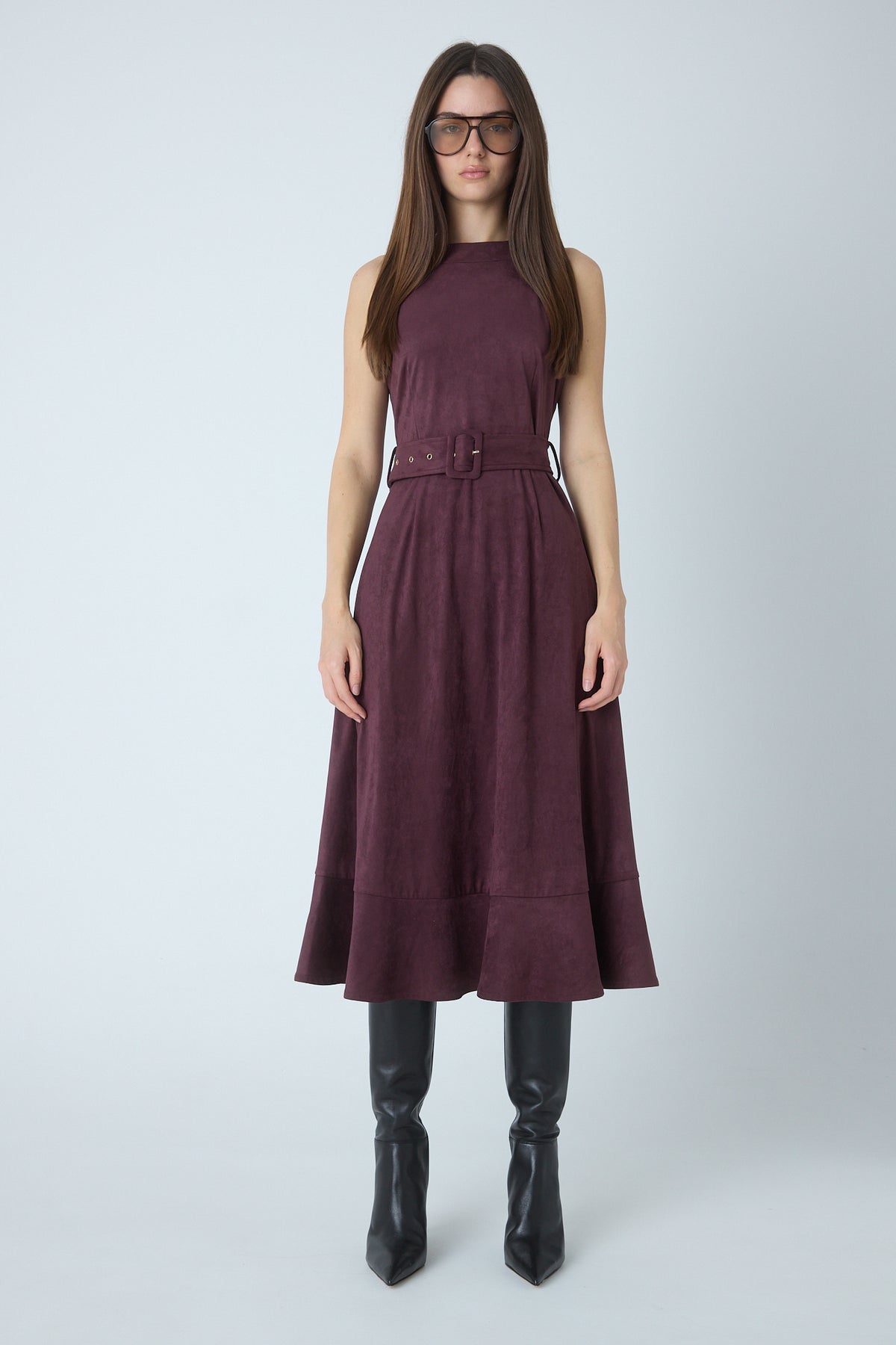 Model wearing the Jalen burgundy faux suede belted dress by JS71