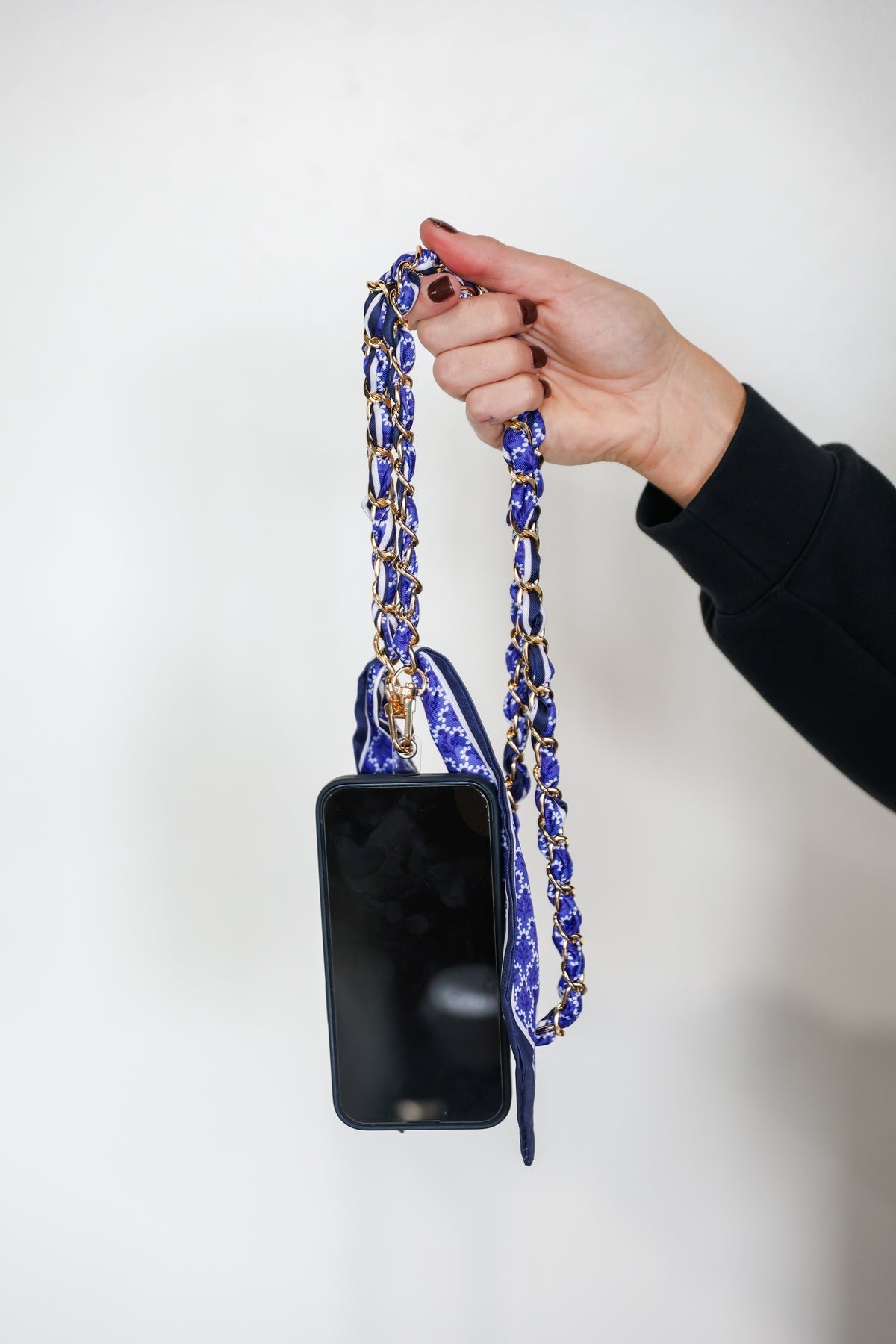 Blue scarf chain bag and phone strap, styled